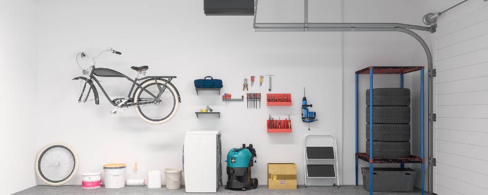 A zoned garage with different storage areas for tools, equipment etc.