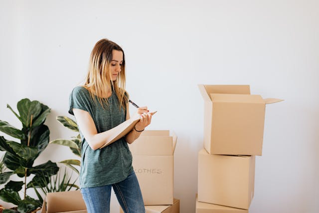 woman with boxes for renovation