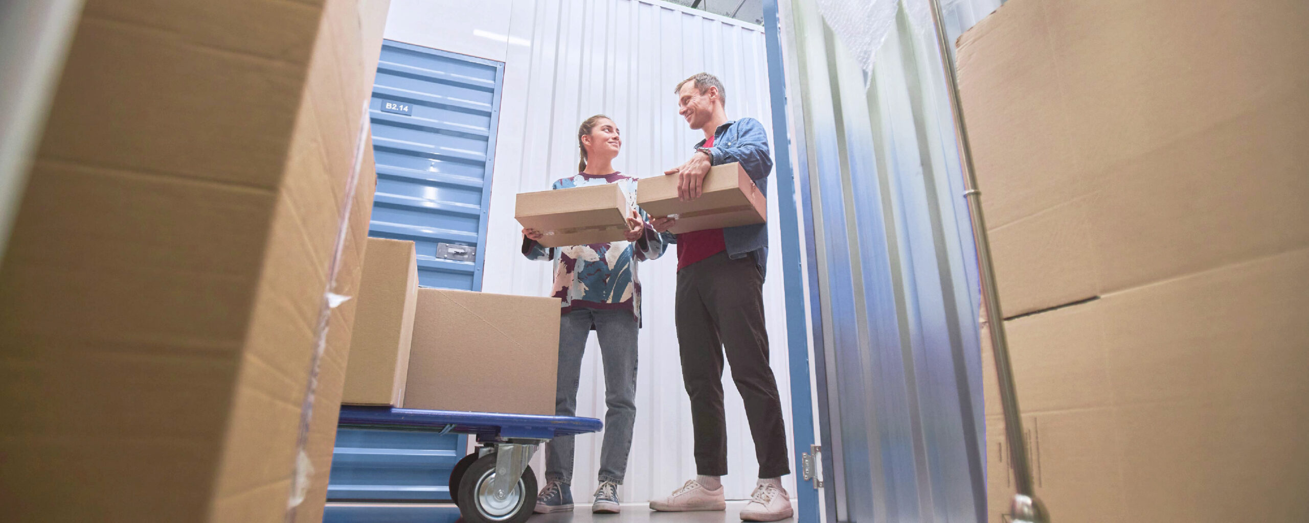 Louth Self Storage Employees helping a customer check in