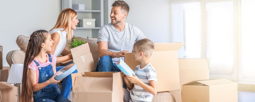 A-happy-family-packing-to-move-into-a-new-home