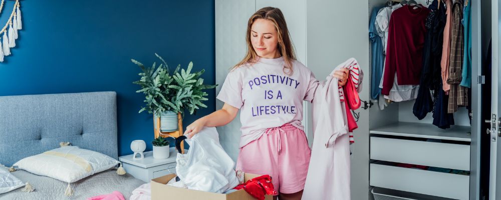 A woman going through her closet